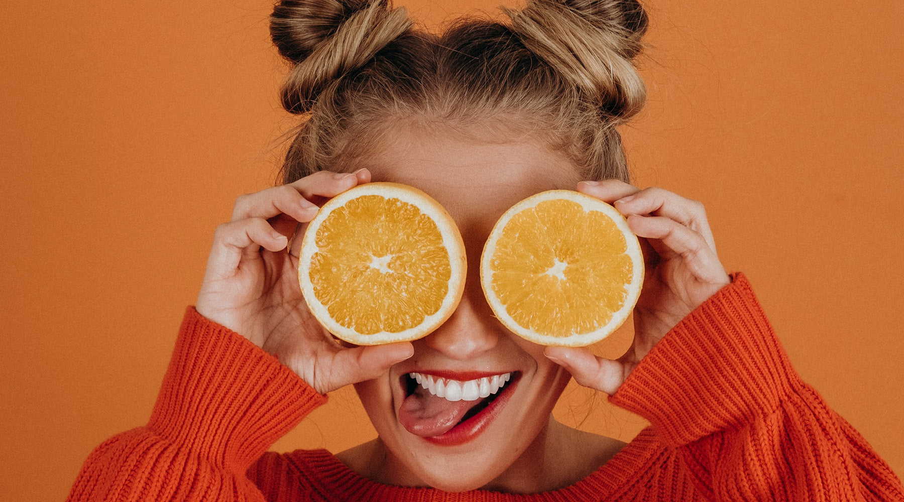 Model with Oranges Beauty Vitamin C for Skin