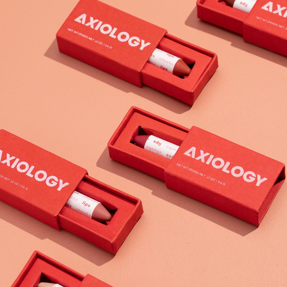Axiology Balmies Vegan Makeup in red box